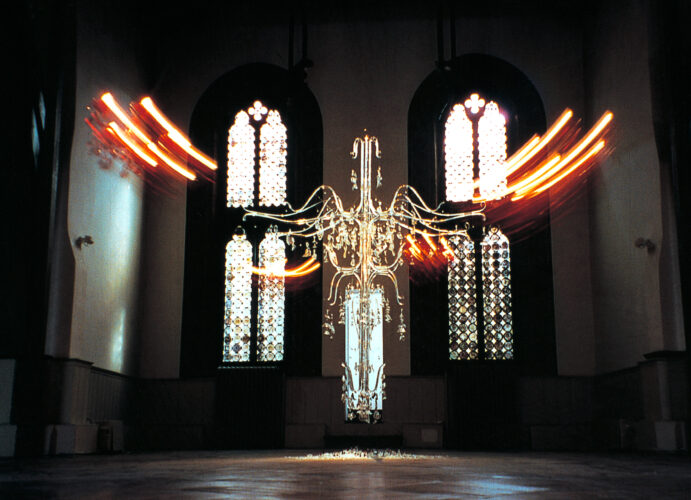 Suzann Victor's 'Dusted By Rich Manoeuvre' at the inaugural Singapore Pavilion at the Venice Biennale, 2001. Pendulum-drivers from repurposed car wind-shield wiper motors, control unit, hand-made chandelier, readymade chandeliers, broken pendants, glass drops. Private Collection. Photo courtesy of the artist.