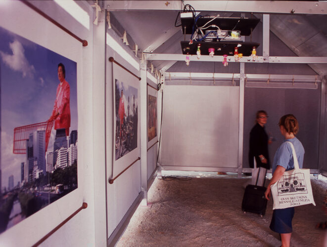 Manit Sriwanichpoom at Thailand’s inaugural Pavilion in 2003. Exhibition View of 'Hungry Ghost', 2003, Manit Sriwanichpoom. Image courtesy of the artist.