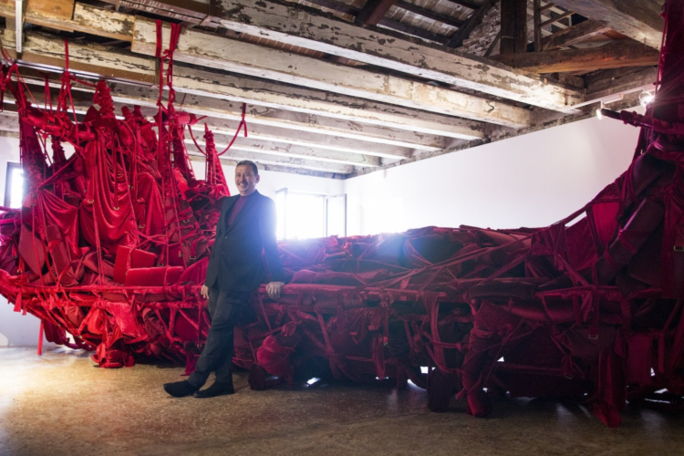 The artist Jose Tence Ruiz with his massive installation, Shoal, Jose Tence Ruiz in collaboration with Danilo Ilag-Ilag and Jeremy Guiab et al, 2015. Shown at the Philippines Pavilion in 2015. Photos by Andrea D'Altoé, courtesy of the Philippine Arts in Venice Biennale (PAVB).