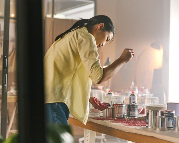 Red Hong Yi working in her studio. Image courtesy of Porsche.